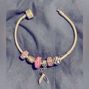 Pandora bracelet and charms. Just been cleaned at jewelry store. Beautiful set